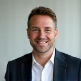 Professional headshot of Benjamin Lee